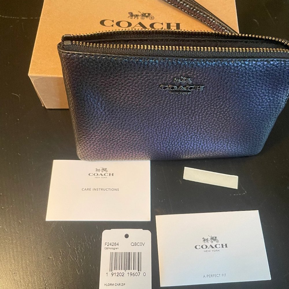 Rare Coach Holographic/Hologram Leather Wristlet with Metallic Coach emblem.